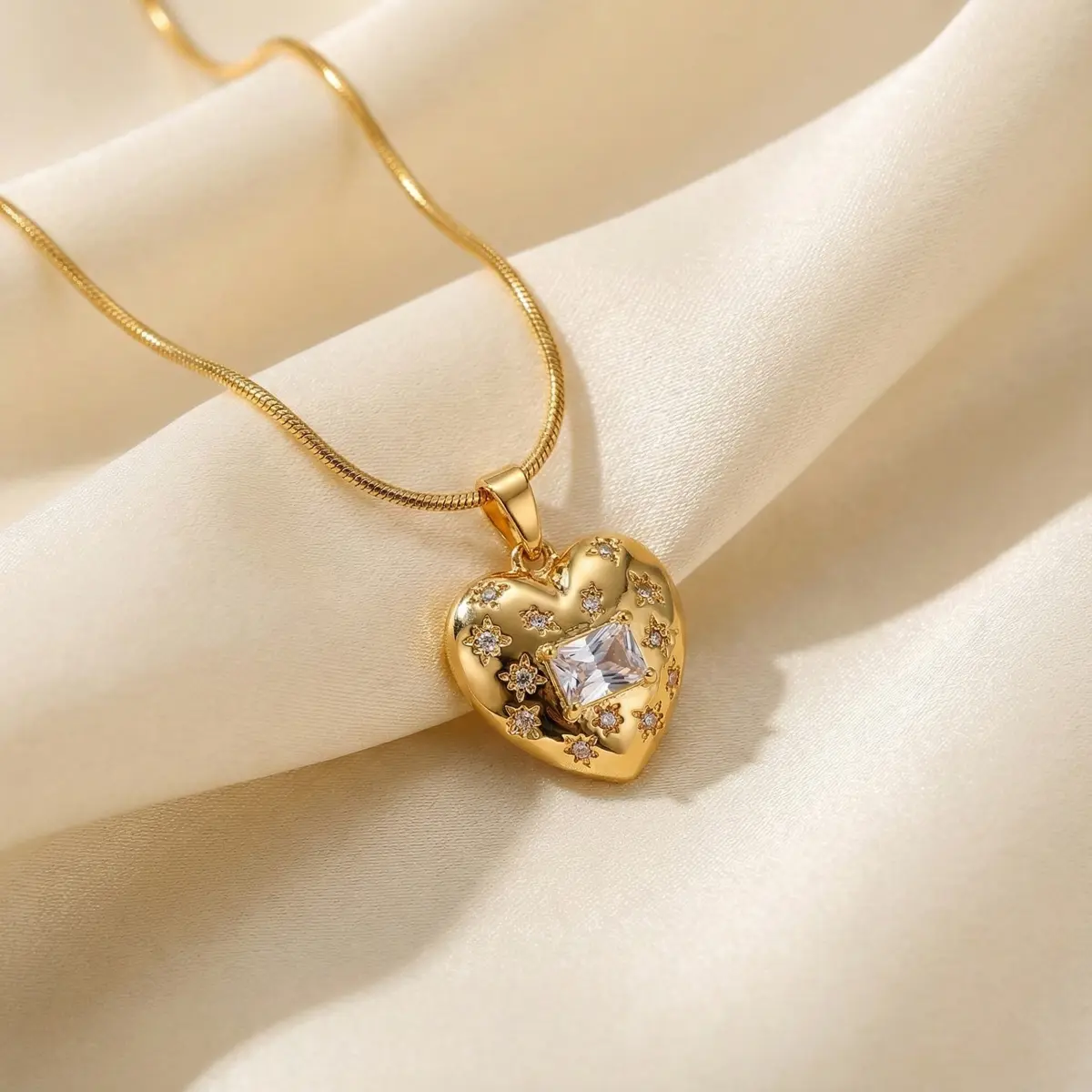 Golden Love Diamond Heart Necklace Placed on Fabric